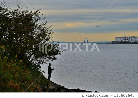 People fishing at the mouth of the Tama River People fishing at the mouth of the Tama River 135602643