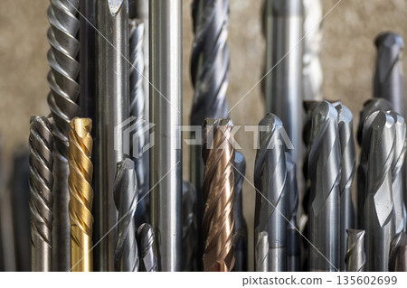 Close Up of Used Solid End Mill Tool for CNC Milling Machine Close Up of Used Solid End Mill Tool for CNC Milling Machine 135602699