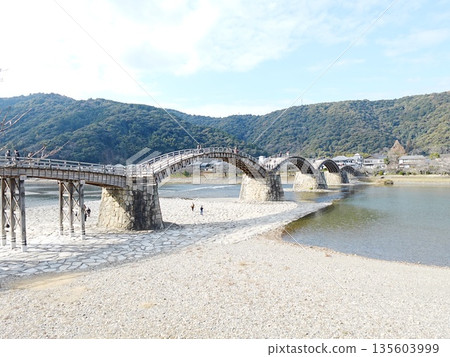 A wooden obi made without nails hanging over the Nishiki River A wooden obi made without nails hanging over the Nishiki River 135603999