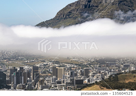 View of Cape Town city from a helicopter with mountain and clouds. South Africa 135604525
