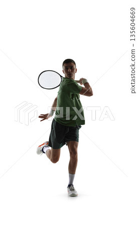 Tennis player backhand follow through isolated on white background. 135604669