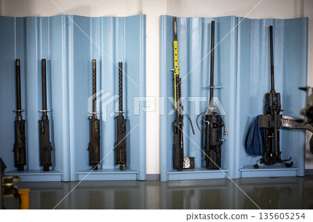 Military machine gun weapon components displayed in armory Military machine gun weapon components displayed in armory 135605254