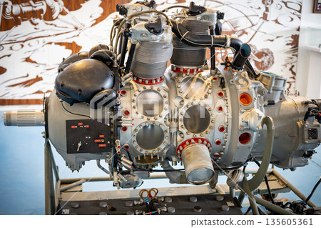 Radial aircraft engine showcasing complex mechanical details 135605361