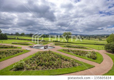 Garden fountain and rural landscape in Curbigny, France Garden fountain and rural landscape in Curbigny, France 135605834