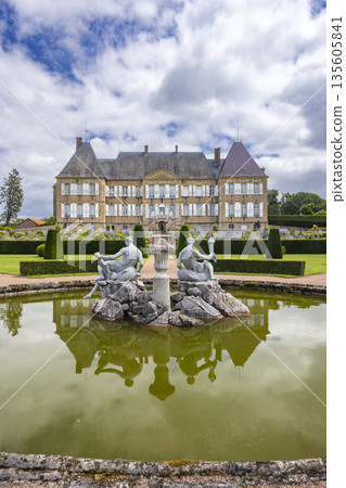 Chateau de Curbigny reflecting with fountain in garden 135605841