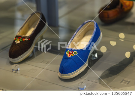 Traditional embroidered slippers displaying Czech folk craftsmanship Traditional embroidered slippers displaying Czech folk craftsmanship 135605847