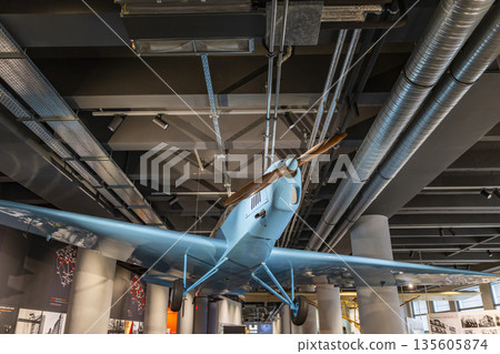 Vintage propeller airplane hanging in museum display Zlin Czechia Vintage propeller airplane hanging in museum display Zlin Czechia 135605874