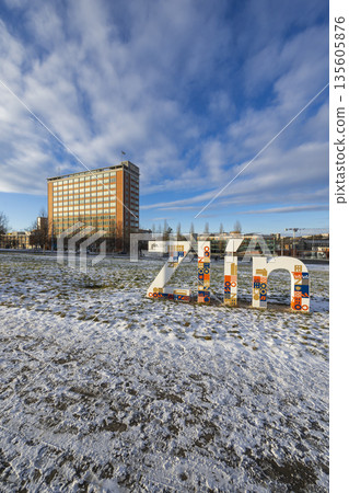 Zlin city sign and Building No 21 on a winter day Zlin city sign and Building No 21 on a winter day 135605876