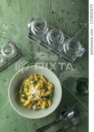 Fusilli pasta with chicken and spinach dinner Fusilli pasta with chicken and spinach dinner 135605879