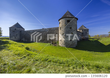 Bzovik fortified monastery castle with stone walls and grass moat in Slovakia Bzovik fortified monastery castle with stone walls and grass moat in Slovakia 135606120