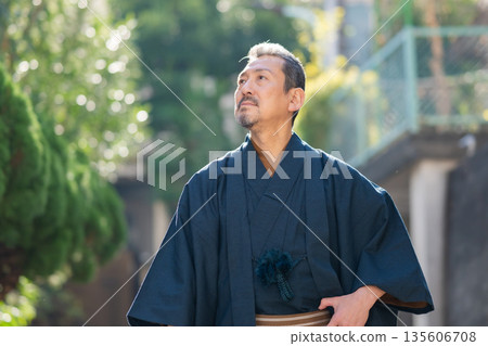 A man wearing a kimono 135606708