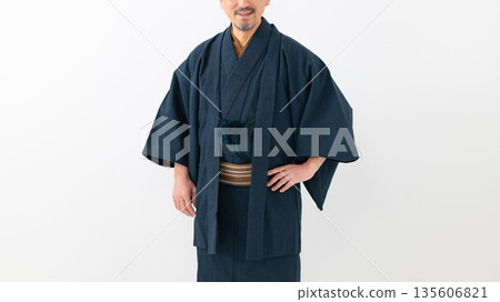 A man wearing a kimono A man wearing a kimono 135606821