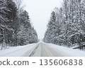 Winter road through the forest 135606838