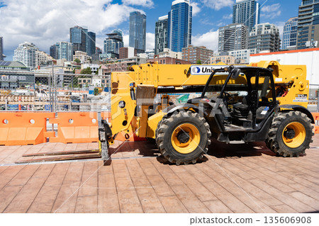 Seattle, Washington, USA - July 26, 2024: Telescopic Boom Lift. Boom lift outdoor. Machine equipment. Heavy crane equipment. Boom lifting machinery. Lift machine crane for building site Seattle, Washington, USA - July 26, 2024: Telescopic Boom Lift. Boom lift outdoor. Machine equipment. Heavy crane equipment. Boom lifting machinery. Lift machine crane for building site 135606908