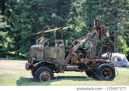 Logging truck equipment. Rusty old school truck. Rusty truck for logging. Machinery equipment. Old rusty logging truck Logging truck equipment. Rusty old school truck. Rusty truck for logging. Machinery equipment. Old rusty logging truck 135607177