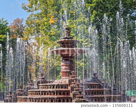 Multi-tiered ornamental fountain in the central park Stephen the great, the public garden of Stefan cel Mare 135608111