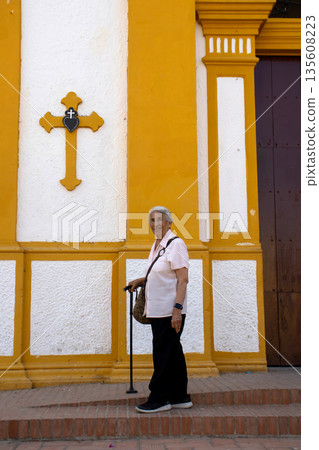 Senior woman at the historical Church of the Immaculate Conception built in 1843 in the beautiful Heritage Town of Mompox in Colombia Senior woman at the historical Church of the Immaculate Conception built in 1843 in the beautiful Heritage Town of Mompox in Colombia 135608223