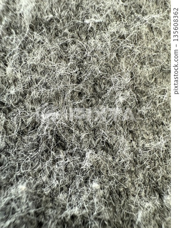 Wool texture macro image showing intricate fibers and patterns, suitable as a background 135608362
