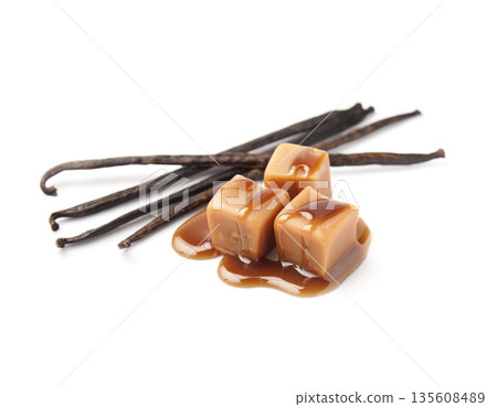 Vanilla pods with caramel candy with topping Vanilla pods with caramel candy with topping 135608489