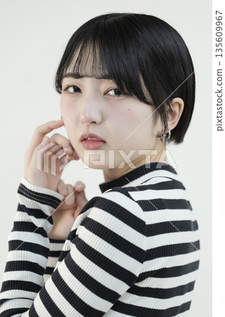 Portrait of an attractive, beautiful young woman in her twenties Portrait of an attractive, beautiful young woman in her twenties 135609967