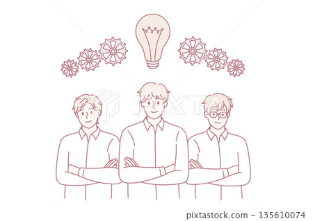 Diverse employees brainstorm using tablet together 135610074