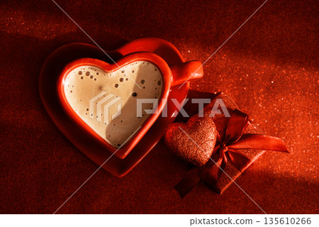 Heart-Shaped Red Coffee Cup on Glitter Background. Romantic Still Life for Valentines Day 135610266