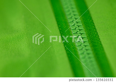 Close up of color zip on sport jacket , macro shot 135610331