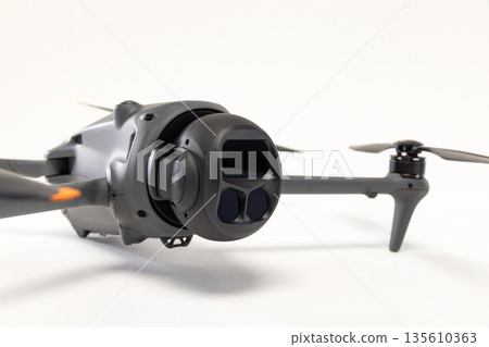 Modern drone with triple cameras isolated on white background 135610363