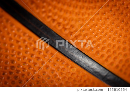 Macro close-up basketball ball with knurling and black line Macro close-up basketball ball with knurling and black line 135610364