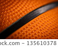 Macro close-up basketball ball with knurling and black line 135610378
