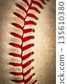 Macro close-up baseball ball with stiches and seam 135610380