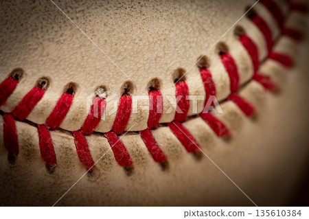 Macro close-up baseball ball with stiches and seam 135610384