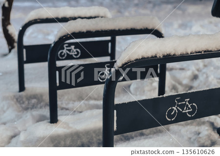 An icy bicycle parking area Shefield Long type, seen in the evening in winter An icy bicycle parking area Shefield Long type, seen in the evening in winter 135610626