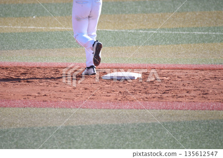 Runner advancing to second base Runner advancing to second base 135612547
