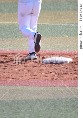 Runner advancing to second base Runner advancing to second base 135612548