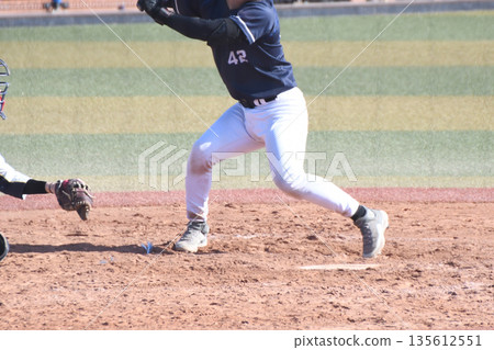 Batter hitting the ball Batter hitting the ball 135612551