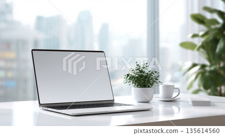 Clean desk and laptop workspace background material for teleworking and working from home 135614560