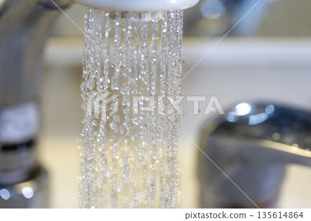 Water flowing from the shower head Water flowing from the shower head 135614864