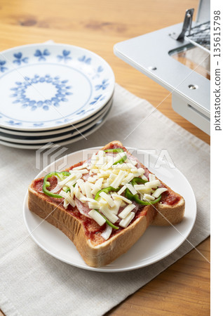 Baking pizza toast in a toaster oven Before baking 135615798