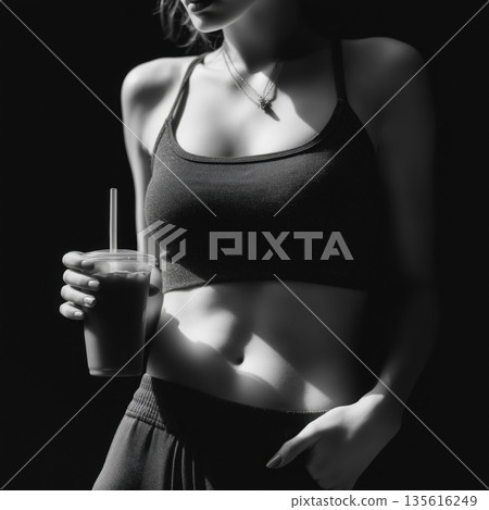 Female torso smoothie sports bra fitness active wear high contrast black and white shadow highlight 135616249