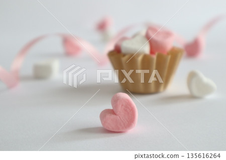 Cute heart-shaped marshmallows and ribbon Cute heart-shaped marshmallows and ribbon 135616264