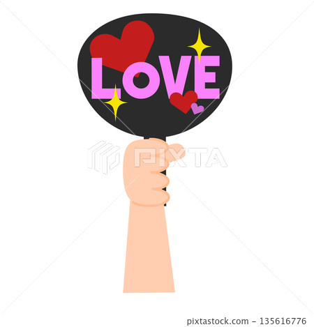 A cheering fan with the word "LOVE" written on it 135616776