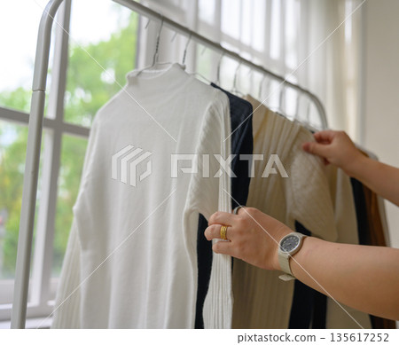 Selecting and organizing knitwear Selecting and organizing knitwear 135617252