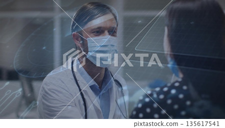 Consulting doctor wearing white coat and mask in consultation room, digital overlay, copy space Consulting doctor wearing white coat and mask in consultation room, digital overlay, copy space 135617541