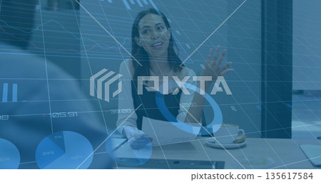 Analyzing businesswoman reviewing papers with pen and coffee cup in meeting room, overlaying data Analyzing businesswoman reviewing papers with pen and coffee cup in meeting room, overlaying data 135617584