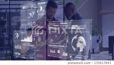 Coworkers wearing shirts analyzing interface panels in open-plan office, with data charts Coworkers wearing shirts analyzing interface panels in open-plan office, with data charts 135617641