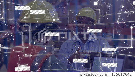 Warehouse worker wearing yellow hard hat and blue shirt checking stock in warehouse with AR overlay Warehouse worker wearing yellow hard hat and blue shirt checking stock in warehouse with AR overlay 135617645