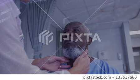 Clinician in scrubs and gloves palpating patient's neck on exam table with hospital gown Clinician in scrubs and gloves palpating patient's neck on exam table with hospital gown 135617660