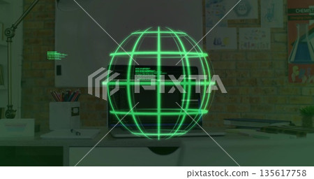 Floating green globe above laptop keyboard with visible code in home office with lamp and pencils Floating green globe above laptop keyboard with visible code in home office with lamp and pencils 135617758
