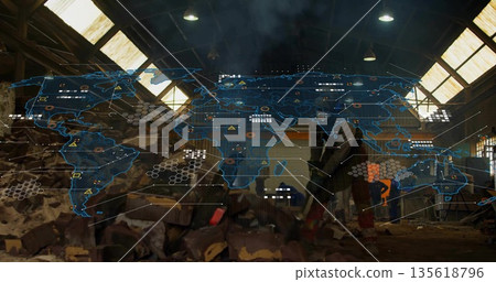Construction workers wearing vests examining holographic map in warehouse, with stone blocks Construction workers wearing vests examining holographic map in warehouse, with stone blocks 135618796